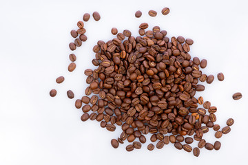 roasted coffee beans isolated on white background top view