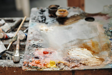 Brushes in the hands of the artist's women. Drawing and art.