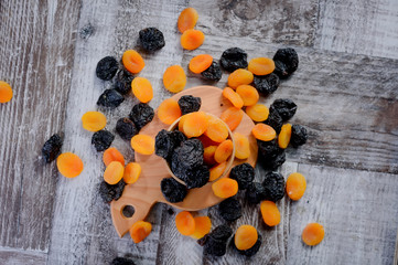 concept wallpaper dried fruits, plums and apricots