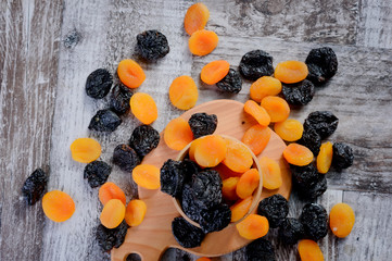 concept wallpaper dried fruits, plums and apricots