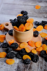 concept wallpaper dried fruits, plums and apricots