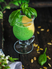 Smoothies, banana, basil, spinach, chia seeds and more healthy food concept. food background. top view