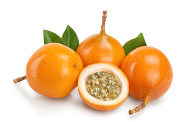 Granadilla or yellow passion fruit with leaf isolated on white background