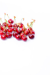 Obraz na płótnie Canvas red cherries isolated on white background