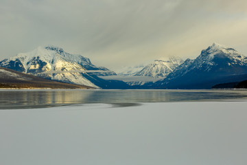 frigid Lake McDonald on an early morning in winter, Glacier National Park, Montana