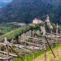 Tyrol Castle with landscape. Tirol Village, Province Bolzano, South Tyrol, Italy.