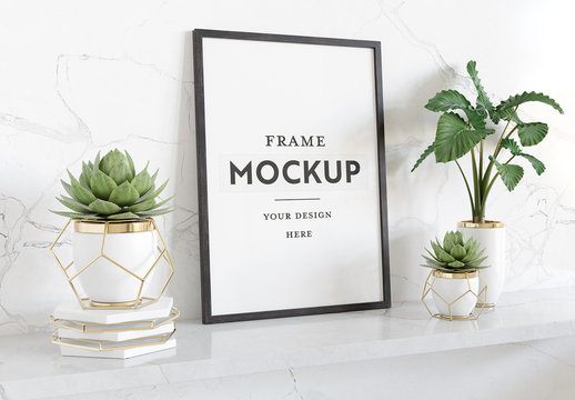 Vertical Frame Leaning on Shelf with Plants Mockup