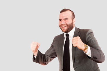 young businessman with suit happy hands up to success