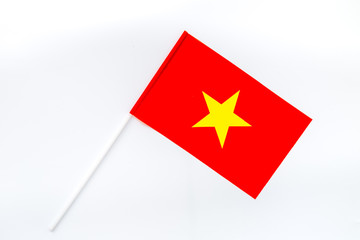 National day of Vietnam concept with flag on white background top view