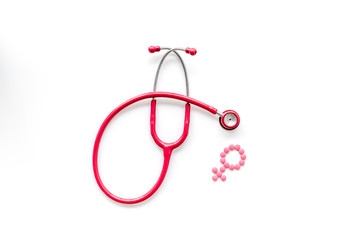 stethoscope and female symbol for diagnostic and cure of gynaecological disease on white background...