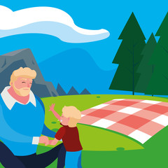 father with son in the field picnic day