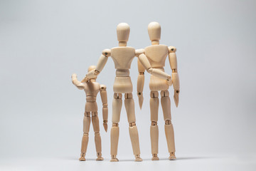 Wooden dummy family on with isolated background