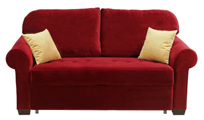 Red sofa isolated on white background. On the couch yellow decorative pillows