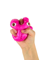 The child's hand very strongly compresses slaym with bright red eyes.