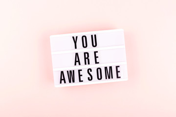 LED lamp with letter, motivation phrase you are awesome.