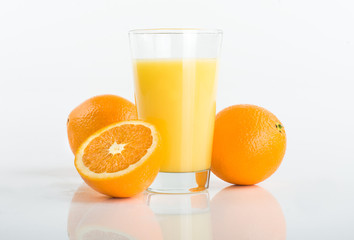 glass of juice and orange