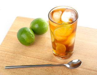 glass of juice on wooden table
