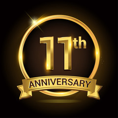 11th golden anniversary logo, with shiny ring and ribbon, laurel wreath isolated on black background, vector design