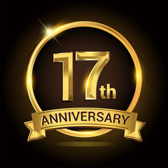 17th golden anniversary logo, with shiny ring and ribbon, laurel wreath isolated on black background, vector design