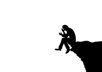 落ち込む男性のシルエット