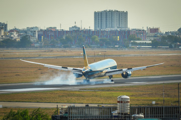 Passenger airplane landing at the airport