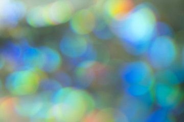 Blurred turquoise circles. Defocused lens flare lights. Abstract background design.