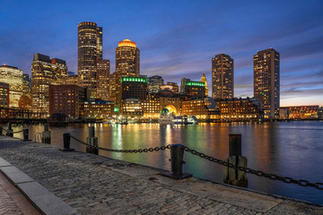 Scene of Boston skyline from Fan Pier at the fantastic twilight time with smooth water river, Massachusetts, USA downtown skyline, Architecture and building with tourist concept