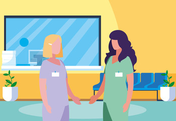 female medicine workers in hospital reception