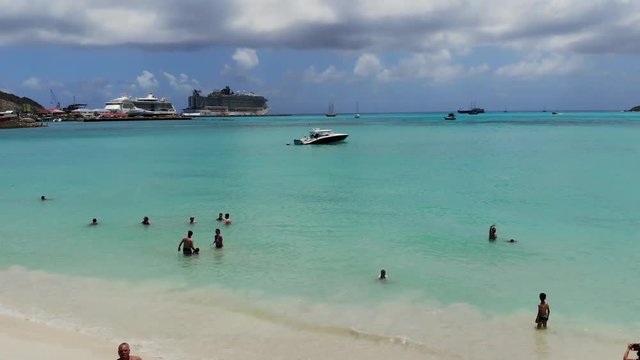 Speedboat and Cruise Ships in the Caribbean Sea Aerial footage of speedboats and cruise ships at the Great Bay Beach, Philipsburg, Sint Maarten/Saint Martin, Caribbean Islands