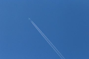 track from plane in a blue sky