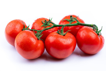 fresh red tomatoes on white background