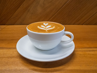 hot cappuccino in white cup, coffee time