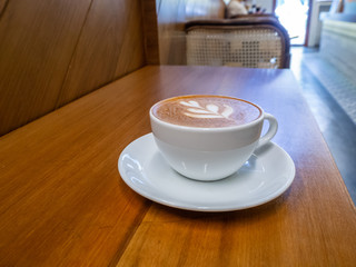 hot cappuccino in white cup, coffee time