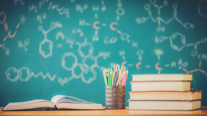 Pencil box school books on desk, Education concept