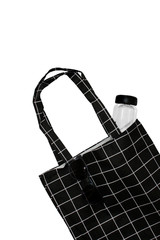 Trendy Shopping bag. Black blank cotton eco tote bag. Environmental Conservation Recycling Concept. Carrier recycle grocery bag. Black cotton bag isolated on white background.Plastic free items. 