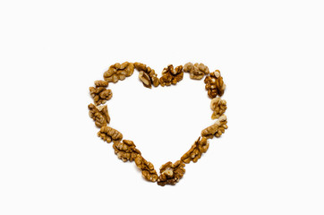 the heart is lined with walnut on white background, with a place for the text 