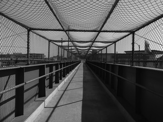 Black and white caged bridge