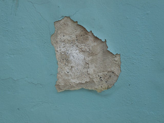 Crack on a blue wall