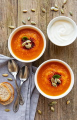 Bowls of pumpkin soup