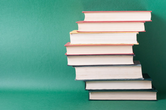 Stack of colorful books. Education background. Back to school. Copy space for text.