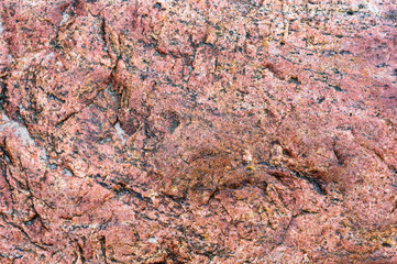 Sea stone texture. Panel texture. Spots red background. Background fill. Natural stone background.