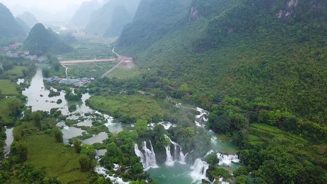 Ban Gioc waterfall or Detian waterfall is a collective name for two waterfalls in border Cao Bang, Vietnam and Daxin County, China. Royalty high-quality free stock video of a beautiful waterfall