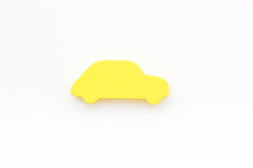 Car insurance concept with car toy on white background top view mockup