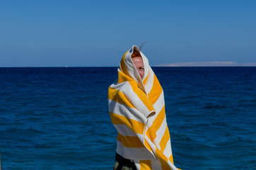 Young woman in towel