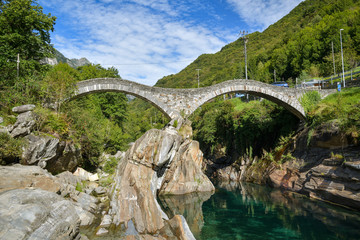 Fototapeta na wymiar Medieval stone bridge Salti near Lavertezzo in Switzerland