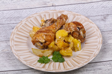 Roasted chicken legs with potato