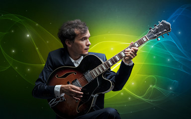 Serious classical guitarist with fabled sparkling wallpaper