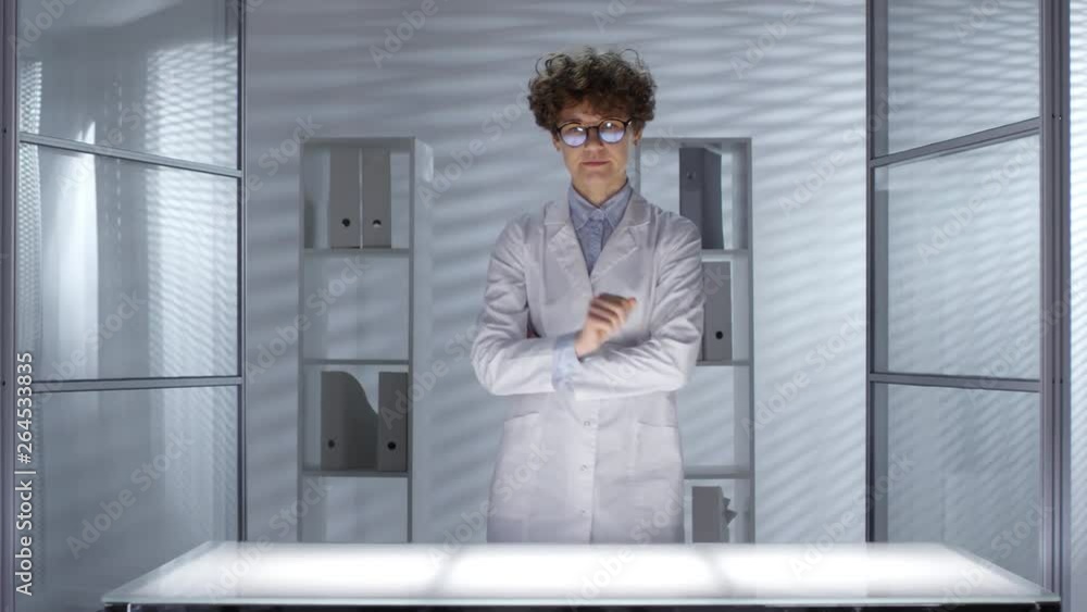 Poster caucasian female doctor turning on illumination of office desk and using invisible multi-touch scree