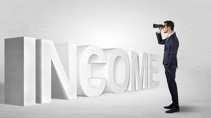 Handsome businessman looking forward with binoculars at a job, income and money concept
