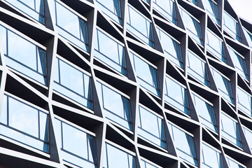 High glass skyscrapers on the streets of Singapore. Office windows close up